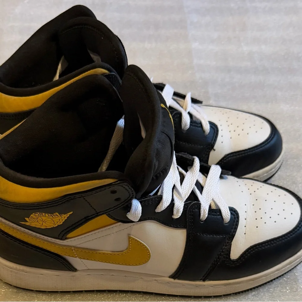 Nike Kids Black and White High-Top Sneakers with Gold Jumpman